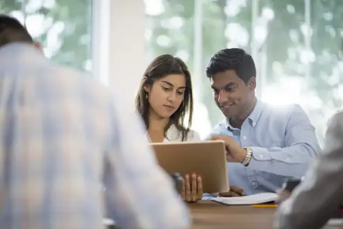Two people collaborating
